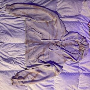 Cropped light weight hoodie with a hood. Light tan marble